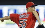 Minnesota Twins pitcher Taylor Rogers throws against the New York Yankees in the fifth inning of a baseball game Friday, June 17, 2016, in Minneapolis
