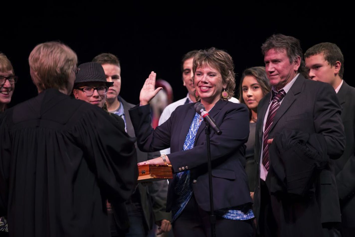 Justice Anne K. McKeig was surrounded by family as she was sworn in to the Minnesota Supreme Court by Chief Justice Lorie S. Gildea at St. Catherine University in St. Paul, Minn., on Thursday, September 15, 2016.