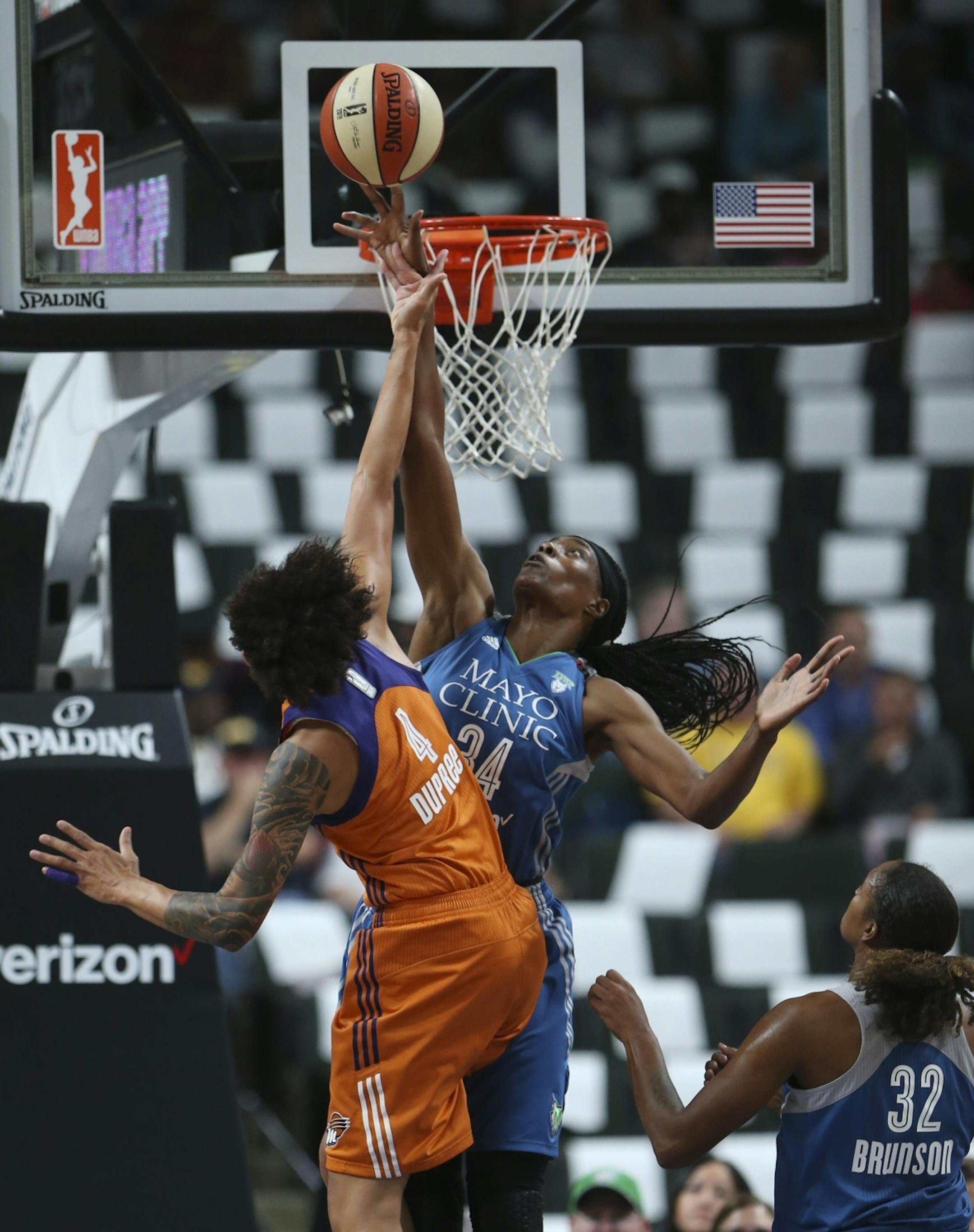 Minnesota Lynx center Sylvia Fowles (34) blocked a first quarter shot by Phoenix Mercury forward Candice Dupree (4).