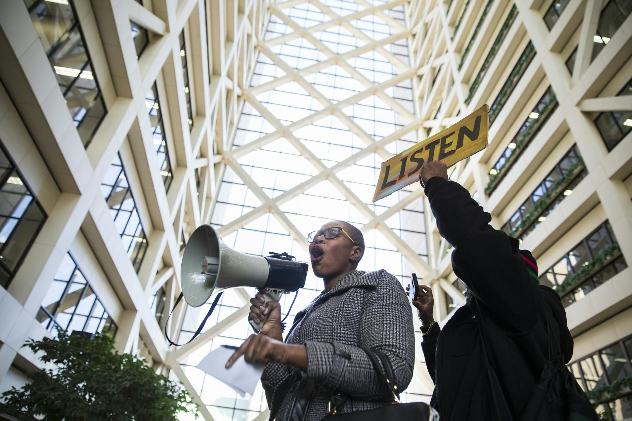 Thandisizwe Jackson-Nissan speaks during a "Freeman Friday" rally at the Government Center.