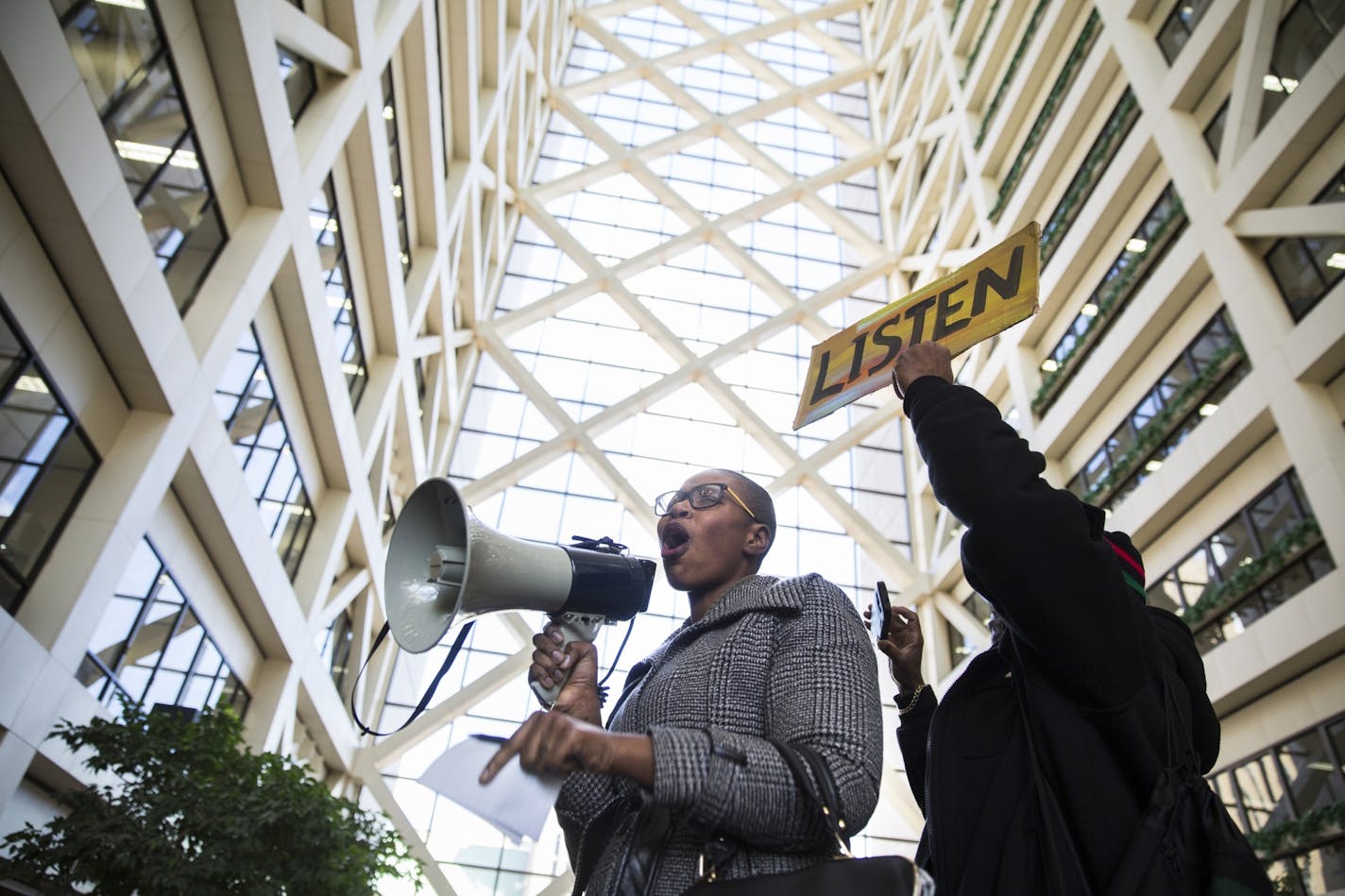 Thandisizwe Jackson-Nissan speaks during a "Freeman Friday" rally at the Government Center.