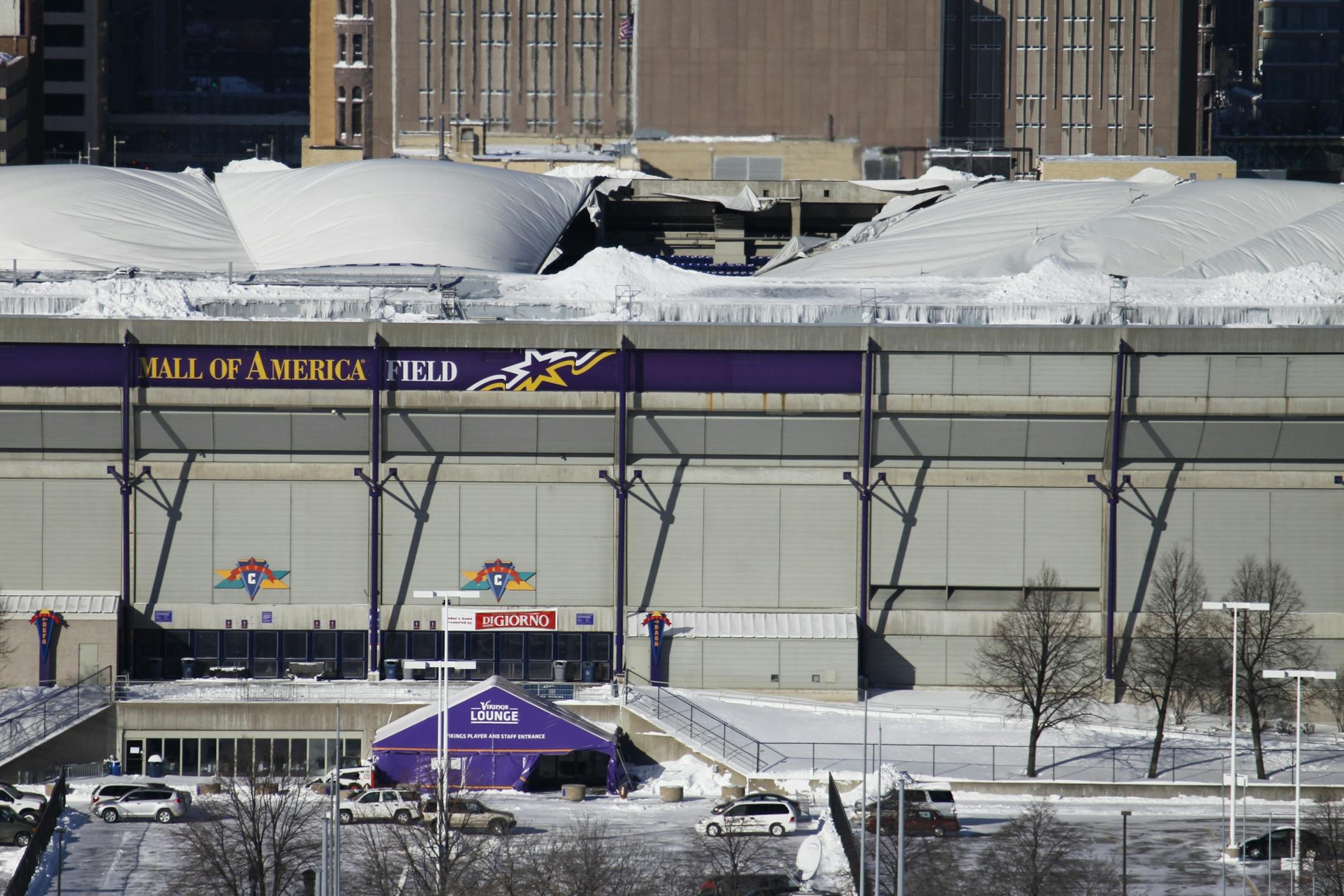 The roof of the Metrodome collapsed under the weight of snow from the winter storm.