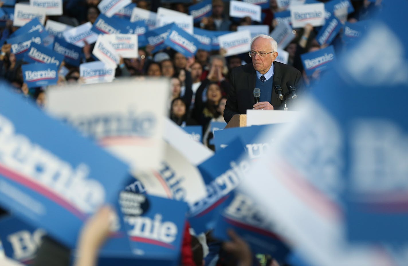 The crowd applauds as presidential candidate Sen. Bernie Sanders speaks during a rally at the University of Michigan main quadrangle on March 8, 2020, in Ann Arbor, Mich. (John J. Kim/Chicago Tribune/TNS) ORG XMIT: 1634594