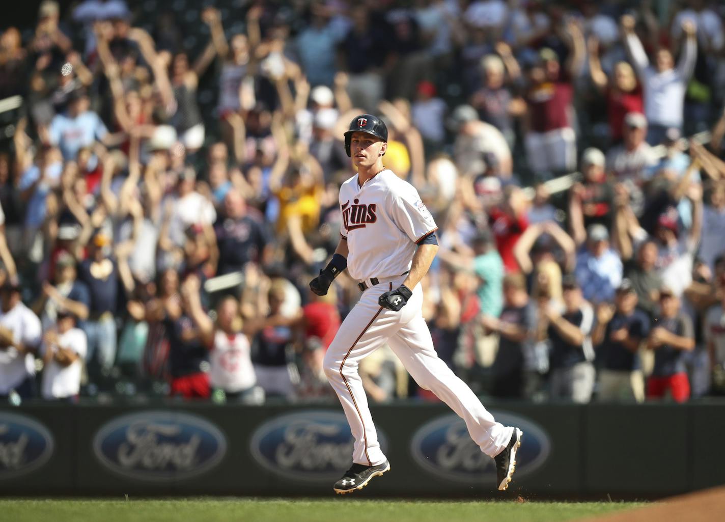 The Twins' Max Kepler watched teammates Brian Dozier and Joe Mauer score after he knocked a three run homer that brought the Target Field crowd to its feet Sunday afternoon. ] JEFF WHEELER &#xef; jeff.wheeler@startribune.com The Twins closed out their series with a 7-4 win over the Boston Red Sox in 10 innings Sunday afternoon, June 12, 2016 at Target Field in Minneapolis.