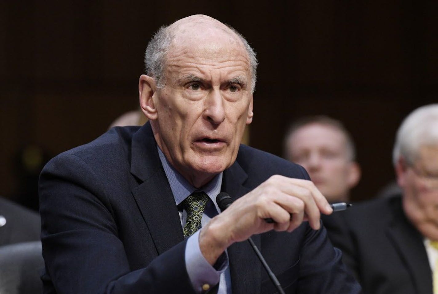 Director of National Intelligence Dan Coats, joined by top intelligence officials, testifies before the Senate Intelligence Committee for a hearing focusing on global threats on Feb. 13, 2018 in Washington, D.C.