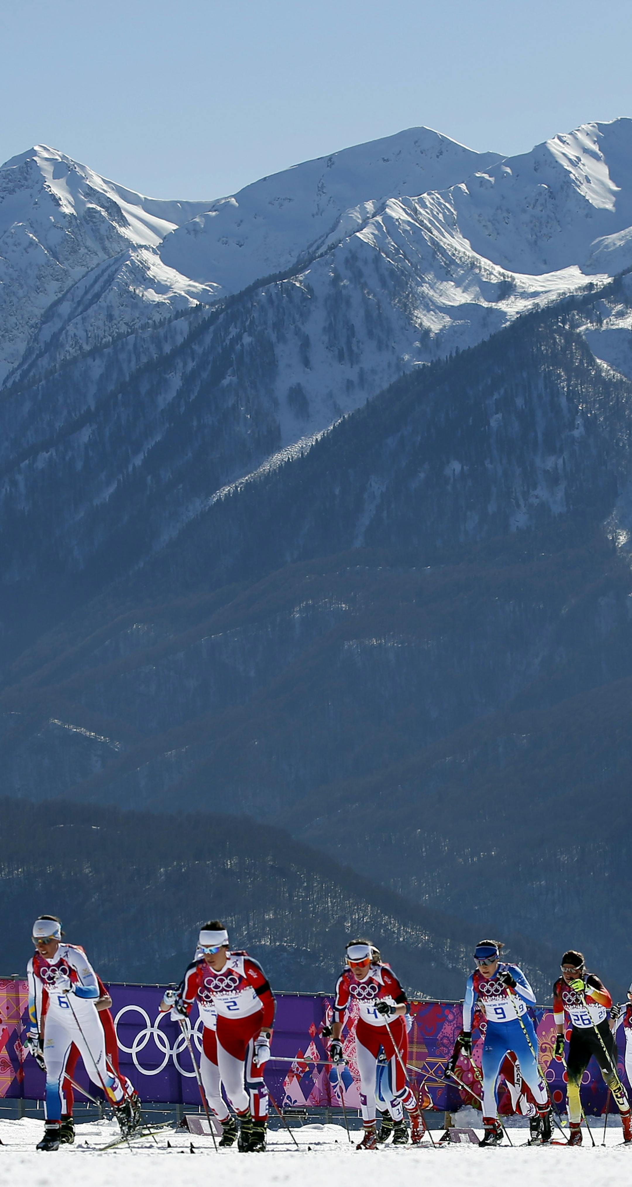 Skiers made their way up an uphill section of the course during the 15km Skiathlon event on Saturday. The gold medal went to Marit Bjoergen of Norway in 38:33.6, while Sweden's Charlotte Kalla took the silver in 38:35.4. Norway's Heidi Weng won the bronze in 38:46.8. ] CARLOS GONZALEZ cgonzalez@startribune.com - February 8, 2013, Krasnaya Polyana, Russia, Sochi 2014 Winter Olympics, Laura Cross Country Ski and Biathlon Center. Women‚Äôs 7.5km + 7.5km Skiathlon, ORG XMIT: MIN1402