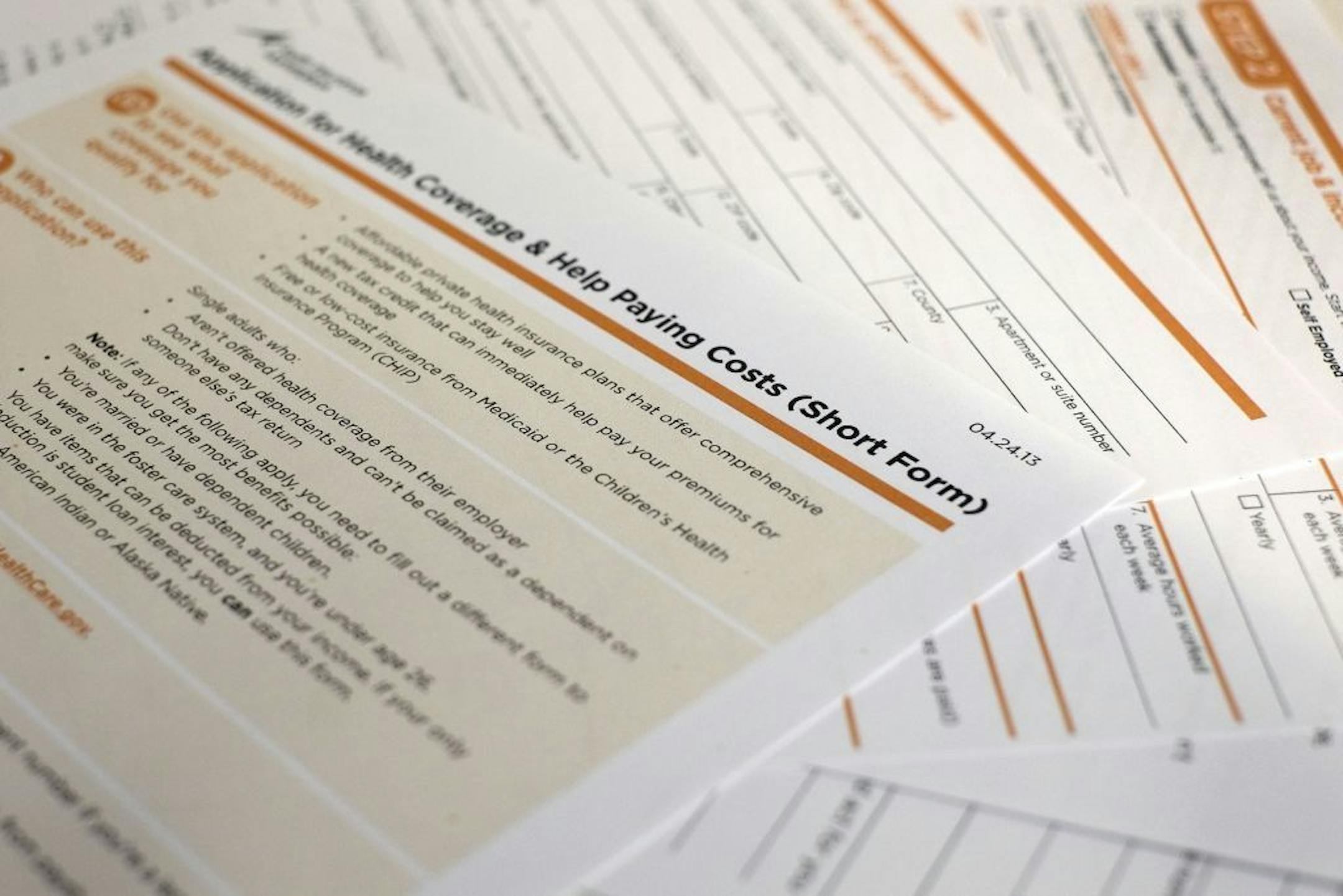 This application obtained by The Associated Press shows the short form for the new federal Affordable Care Act. The first draft was as mind-numbing as a tax form. Tuesday the Obama administration unveiled simplified application forms for health insurance benefits under the federal health care overhaul. The biggest change: a five-page short form that single people can fill out. That total includes a cover page with instructions, and an extra page to fill out if you want to designate someone to he