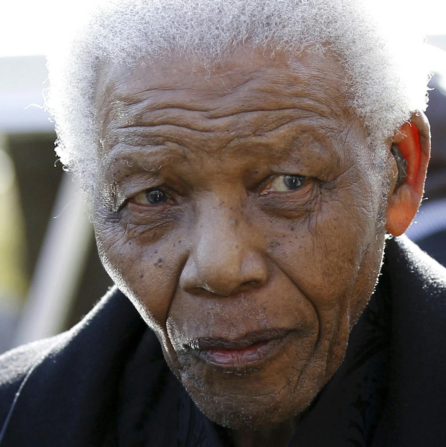 FILE - In this June 17, 2010 file photo, former South African President Nelson Mandela leaves the chapel after attending the funeral of his great-granddaughter Zenani Mandela in Johannesburg, South Africa. The South African presidency says Nelson Mandela was re-admitted to hospital with a recurrence of a lung infection Thursday March 28, 2013. (AP Photo/Siphiwe Sibeko, Pool, File)