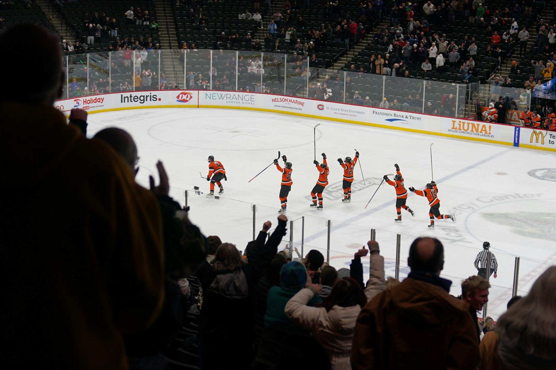 Moorhead head Spuds celebrate their goal in the third period after Edina pulled their goalie, which tied with Edina 6-6 sending the game into overtime.