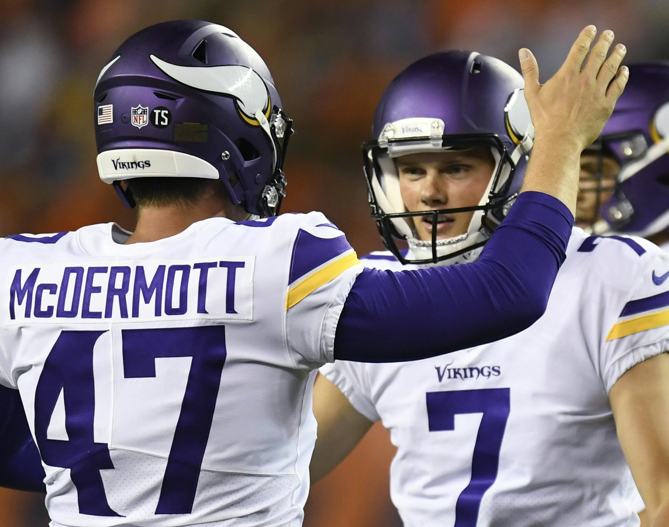 Minnesota Vikings kicker Daniel Carlson, right, celebrates with long snapper Kevin McDermott after kicking a 57 yard field goal in the second half of an NFL football game against the Denver Broncos Saturday, Aug. 11, 2018, in Denver. (AP Photo/Mark Reis)