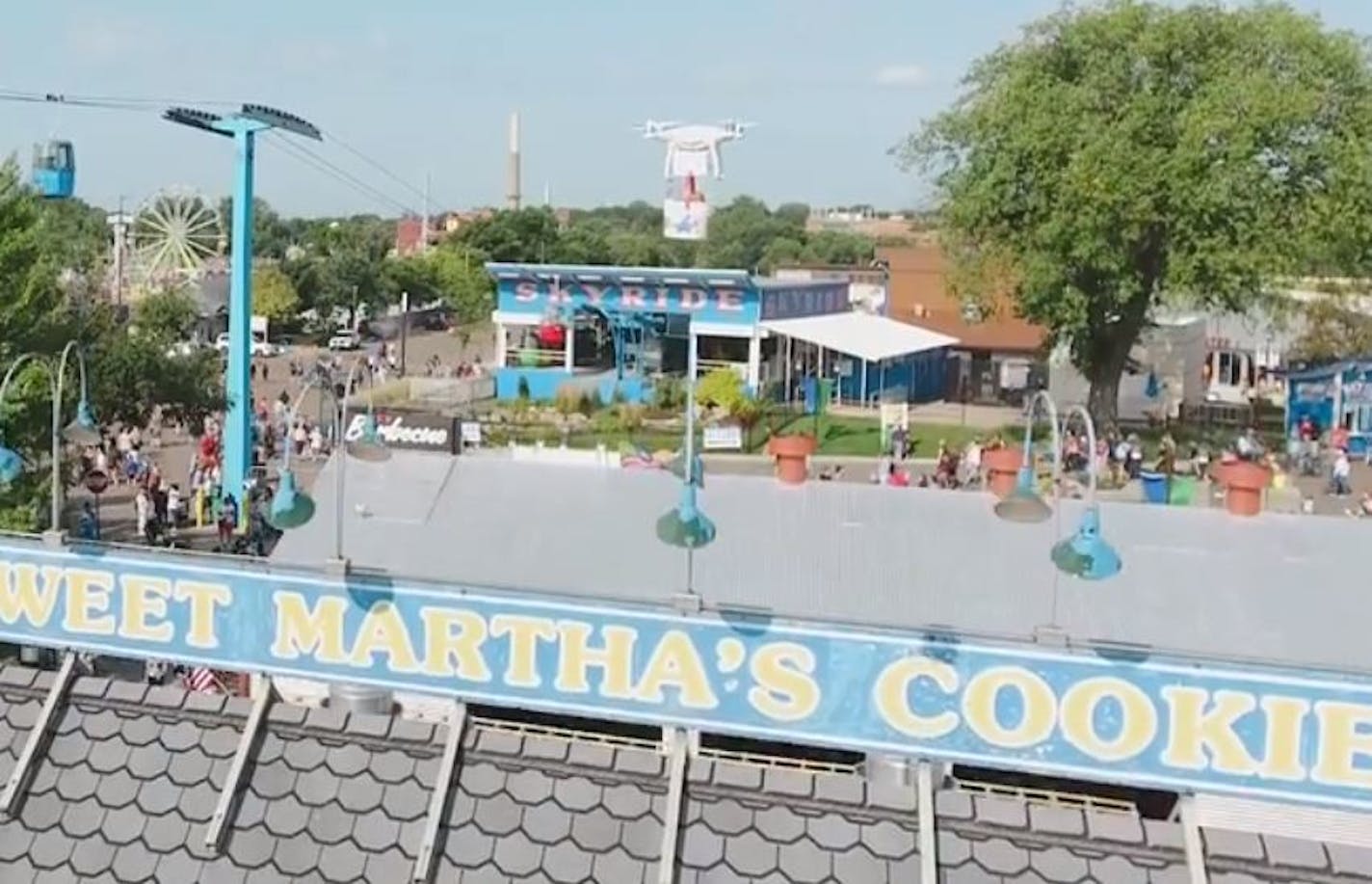 A bucket of Sweet Martha's cookies being delivered by drone over the Minnesota State Fair.