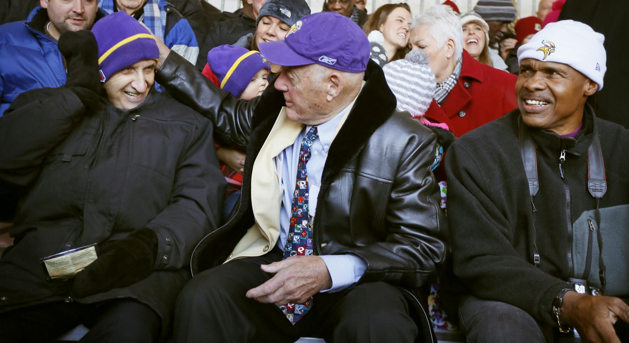 Star Tribune columnist Sid Hartman left, former Vikings coach Bud Grant, and former Vikings linebacker Matt Blair attended a ceremony were a street was dedicated honor Bud Grant near the new Vikings stadium December 1, 2014 in Minneapolis, MN.