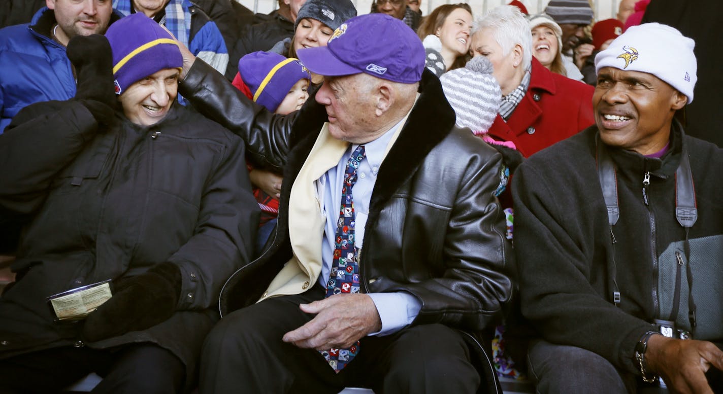 Star Tribune columnist Sid Hartman left, former Vikings coach Bud Grant, and former Vikings linebacker Matt Blair attended a ceremony were a street was dedicated honor Bud Grant near the new Vikings stadium December 1, 2014 in Minneapolis, MN.