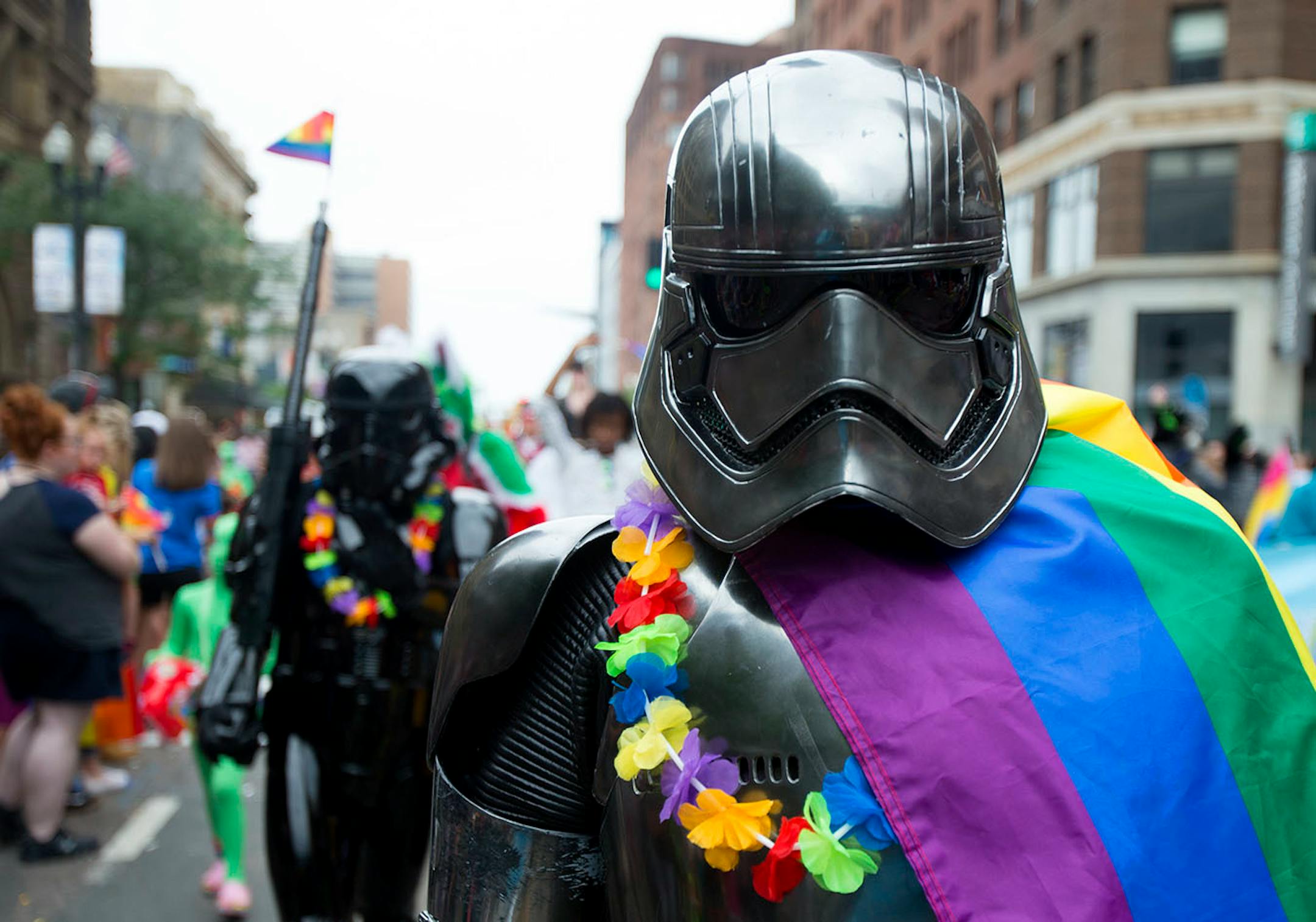 A person dressed as Captain Phasma from the Star Wars sequel trilogy marched in the pride parade with others dressed as Star Wars characters on Sunday.