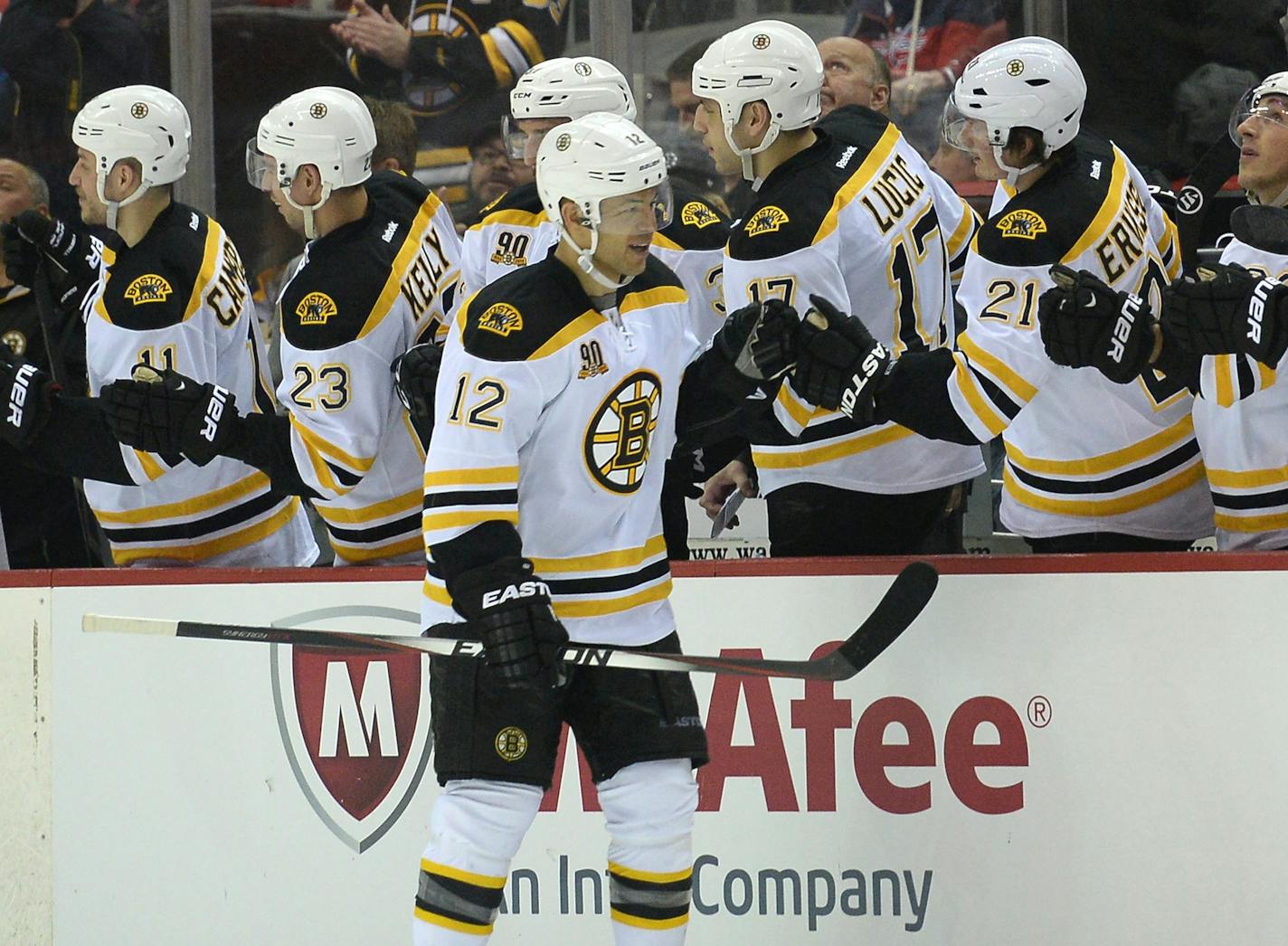 Boston Bruins right wing Jarome Iginla (12) celebrates with teammates on the bench after his first of two goal against the Washington Capitals in the second period at the Verizon Center in Washington, Saturday, March 29, 2014. (Chuck Myers/MCT) ORG XMIT: 1151016