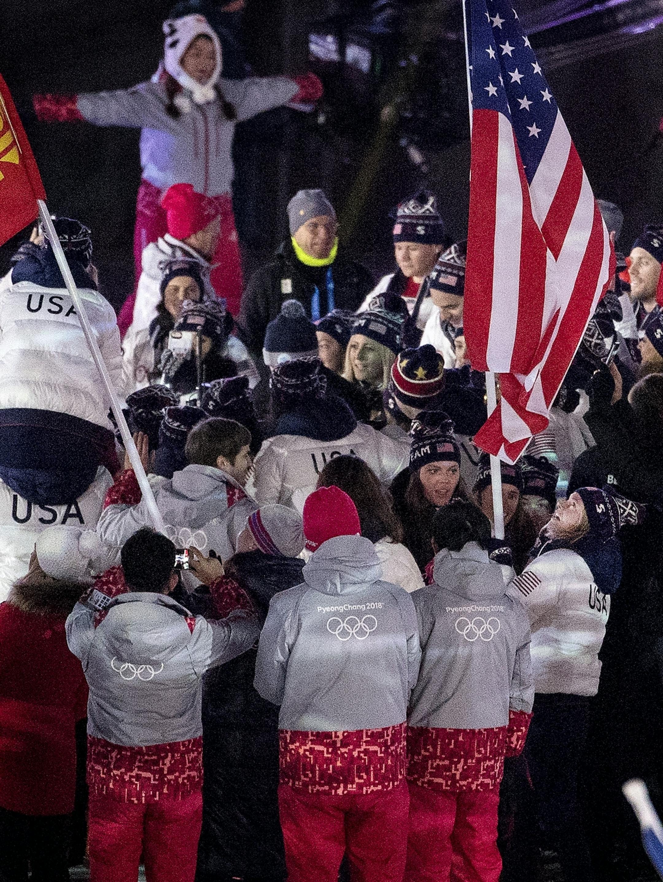Jessie Diggins carried the flag for team USA at Closing Ceremony on Sunday night.
