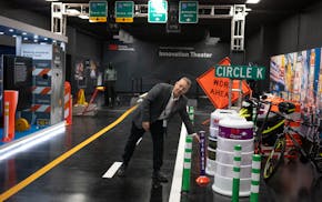 JC Ojeda, a global application engineer at 3M, gives a presentation on Dec. 19 on road safety products made by 3M.