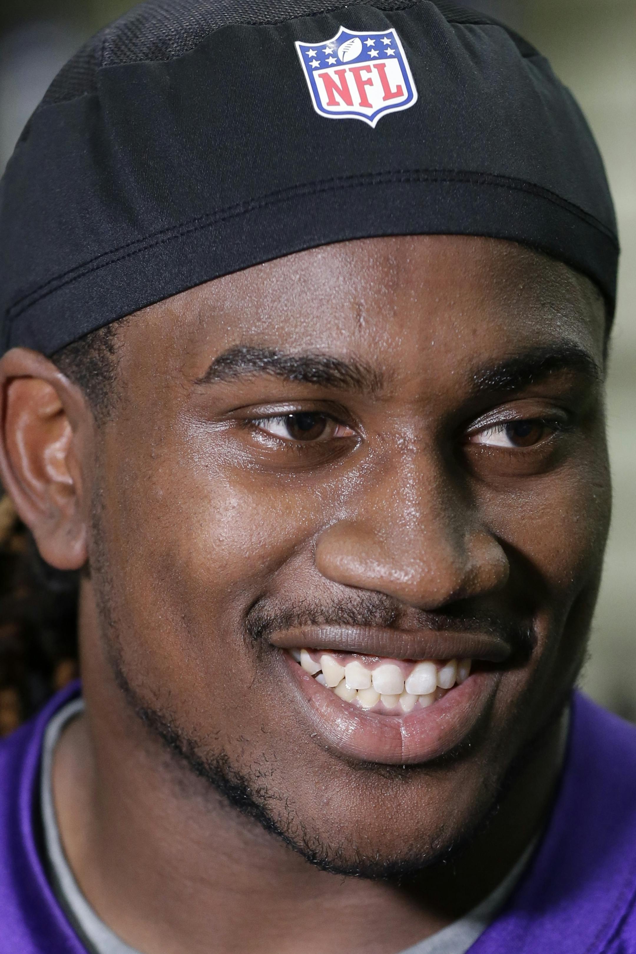 Rookie wide receiver Cordarrelle Patterson talks with reporters after the Minnesota Vikings NFL football rookie camp Friday, May 3, 2013 in Eden Prairie, Minn. (AP Photo/Jim Mone) ORG XMIT: NYOTK