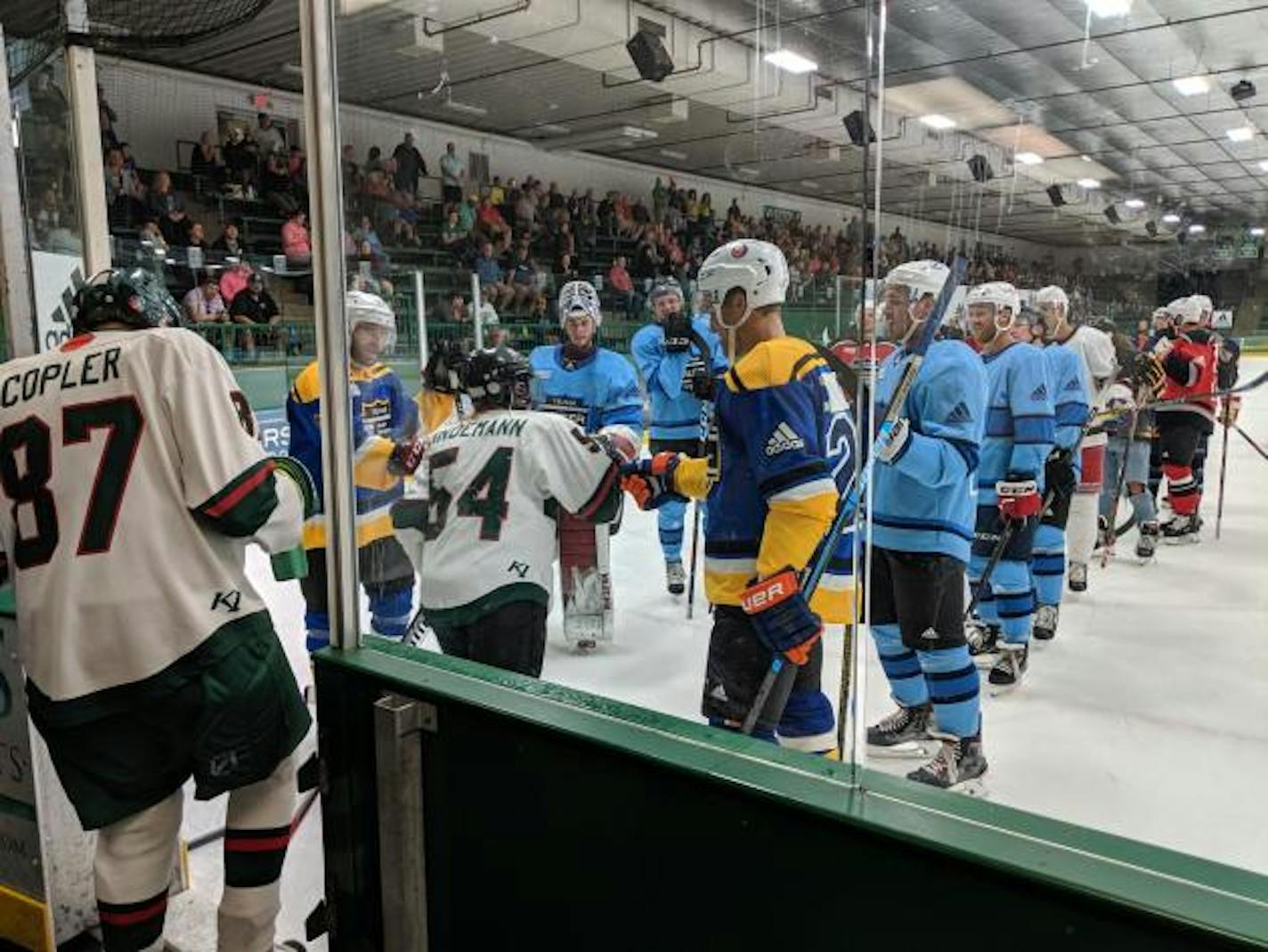 NHL players in Da Beauty League formed a tunnel for on-ice introductions of Minnesota Special Hockey players during the Unified Showcase on Monday, Aug. 19, at Braemar Arena in Edina.