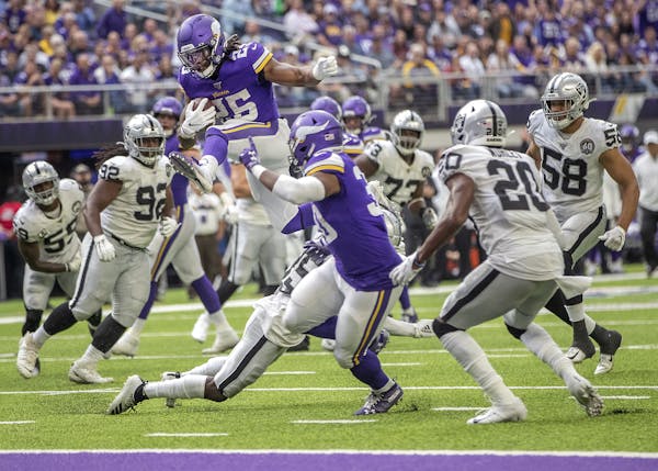 Vikings running back Alexander Mattison hurdled over the Raiders defense for a first career touchdown in third quarter. ] ELIZABETH FLORES • liz.flo