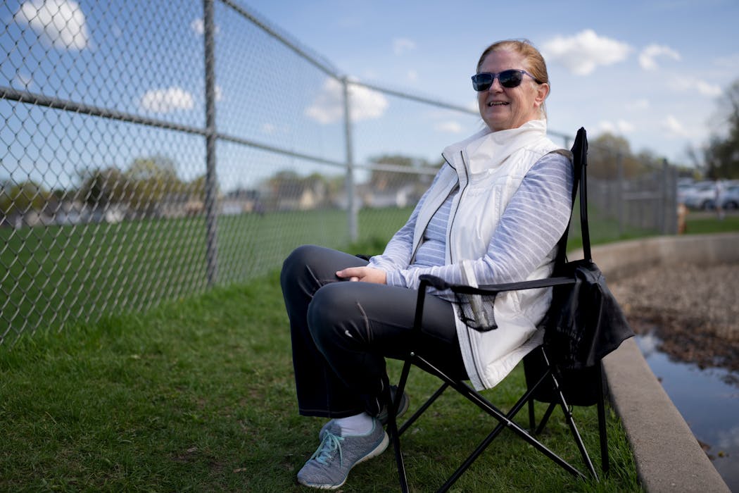 Teresa Mauer watched her granddaughter play softball for Cretin-Derham Hall in St. Paul earlier this month. She said her own parents showed up to cheer for her and her siblings and made them believe they could 