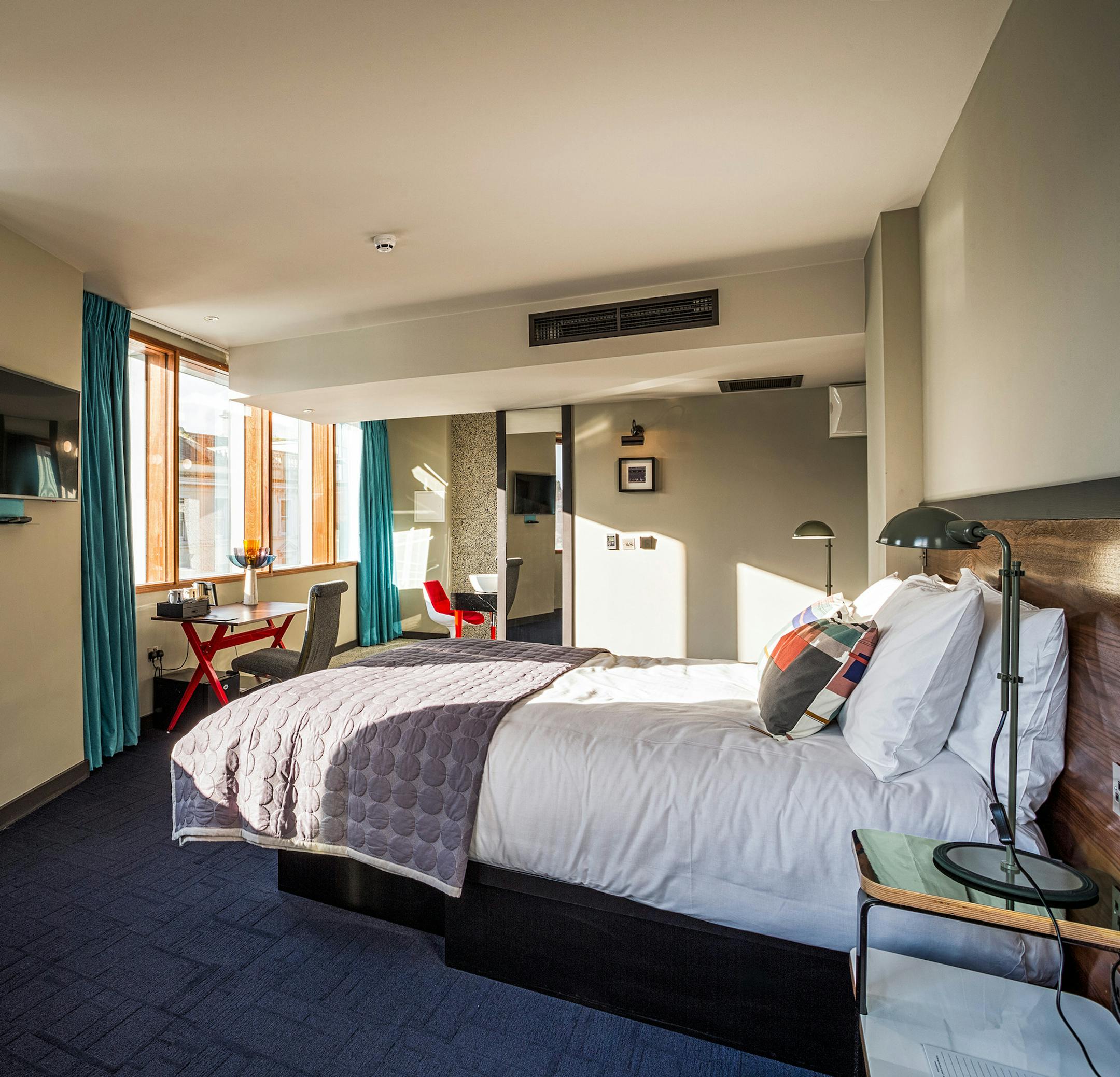 -- PHOTO MOVED IN ADVANCE AND NOT FOR USE - ONLINE OR IN PRINT - BEFORE FEB. 25, 2018. -- In an undated photo provided by Bullitt Hotel, a "Comfy" room at the Bullitt Hotel in Belfast, Ireland. Northern Ireland’s — and perhaps the world’s — sole Steve McQueen-themed hotel was opened by the Beannchor Group in October 2016 with 43 rooms. (Bullitt Hotel via The New York Times) -- NO SALES; FOR EDITORIAL USE ONLY WITH NYT STORY BELFAST HOTEL BY LYNN FREEHILL-MAYE FOR FEB.