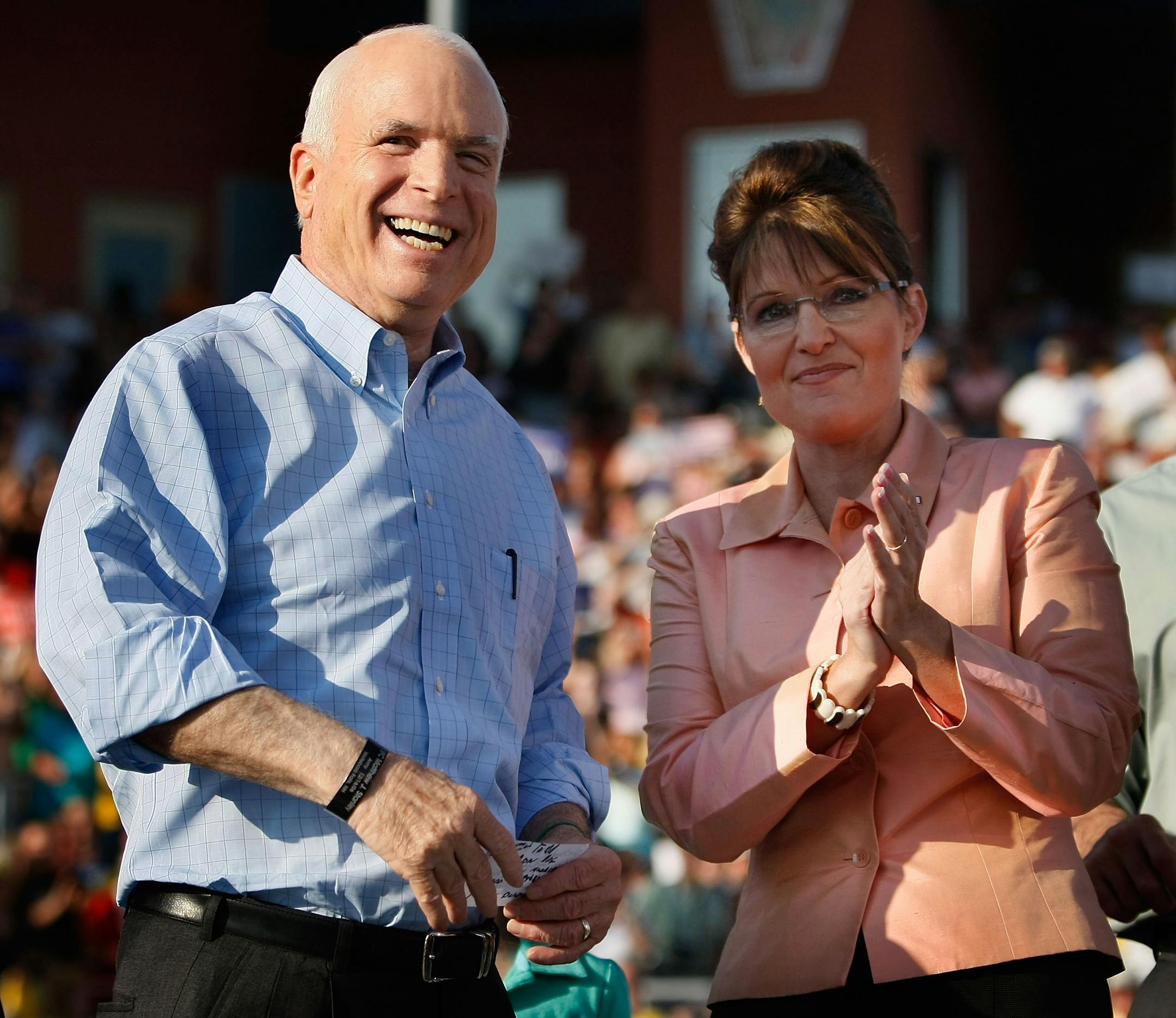 Presumptive Republican presidential nominee John McCain (R-AZ) and presumptive Republican vice-presidential nominee Alaska Gov. Sarah Palin stand on stage as they greet supporters during an event at Consol Energy Park August 30, 2008 in Washington, Pennsylvania.