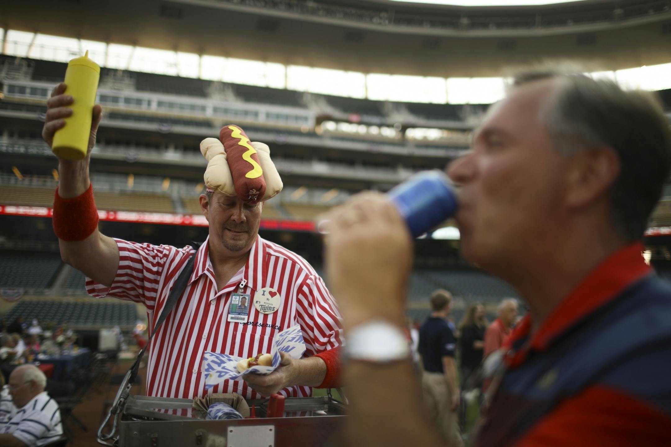 Hot Dog Mark Carlson roamed the infield serving ball park dogs.