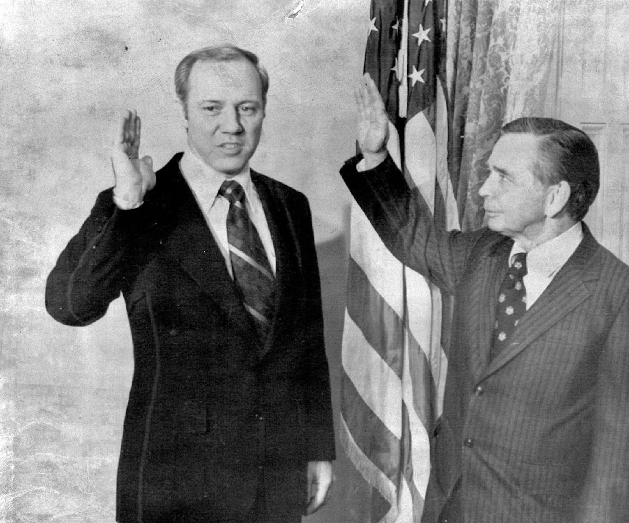 January 14, 1975 New Congressman -- Rep.James Oberstar. D-minn., is shown in as a new member of congress in this re-enactment at the capitol Tuesday by house speaker Carl Albert, D-Okla. AP Wirephoto