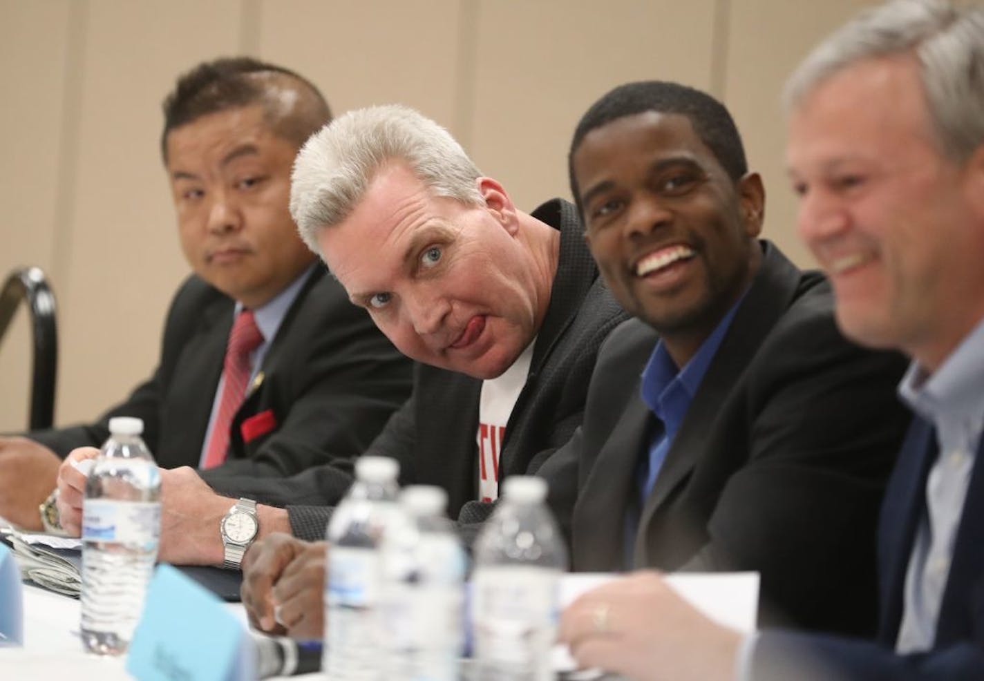 Hmong Americans for Justice and Hmong American Partnership cohosted a nonpartisan mayoral forum for Hmong Saint Paul residents and allies to be informed about how each candidate plans to advocate for the Hmong community. Here, mayoral candidate Dai Thao, left to right, Tim Holden, Melvin Carter III, Pat Harris during the forum Saturday, April 8, 2017, in St. Paul, MN.