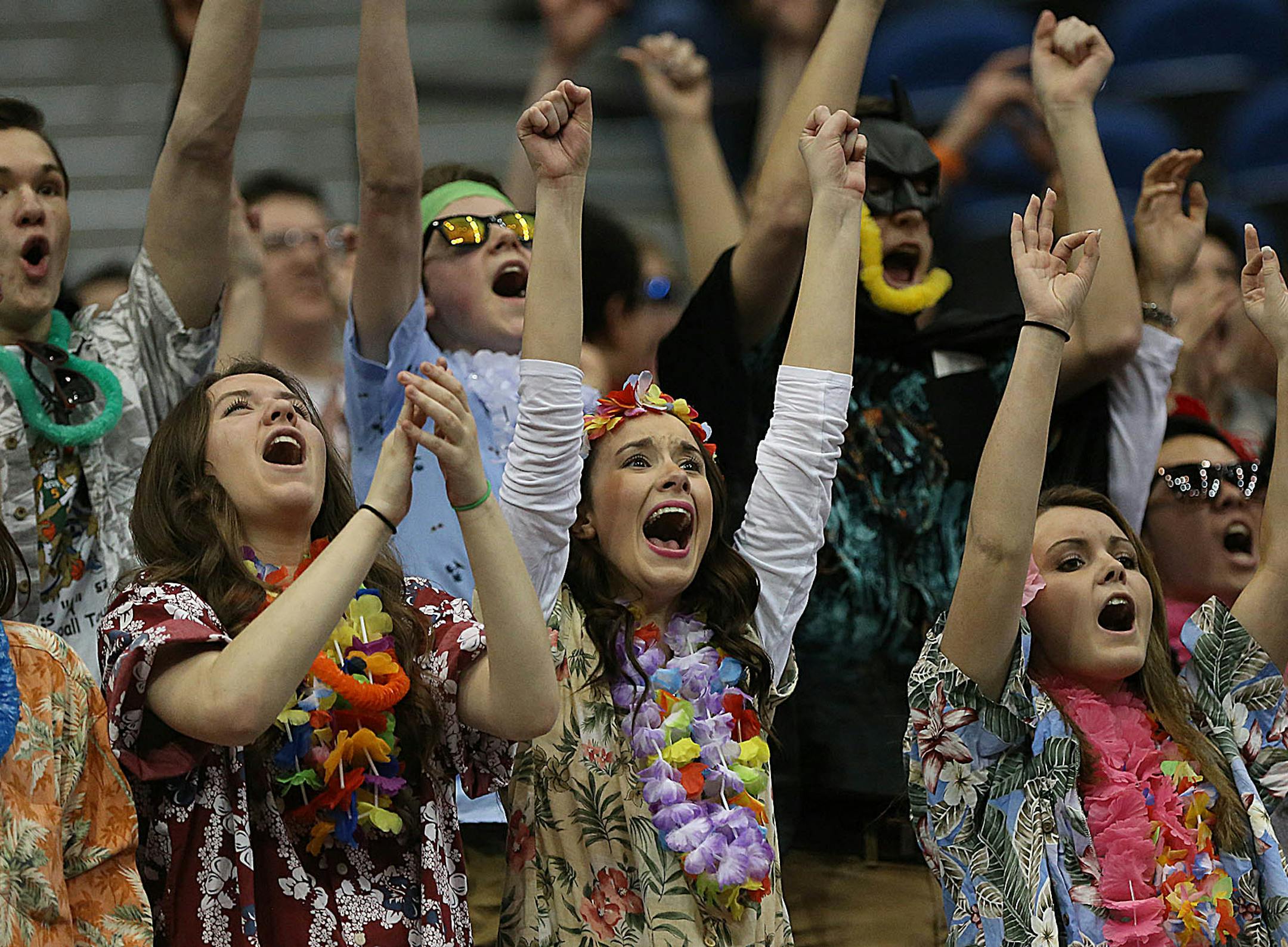 Fans of the Maranatha Christian Academy Mustangs cheered on their team in the firs half. ] JIM GEHRZ ï james.gehrz@startribune.com / Minneapolis, MN / March 13, 2015 /2:00 PM ñ BACKGROUND INFORMATION: The Battle Lake High School Battlers played the Maranatha Christian Academy Mustangs in the State Boys' Basketball Tournament Class 1A semifinals at the Target Center.