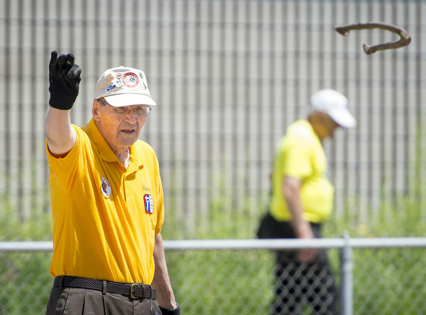 Harold Schrader, 93, of Easton, Minn., competed in the first day of the 70-and-over horseshoe competition Tuesday.