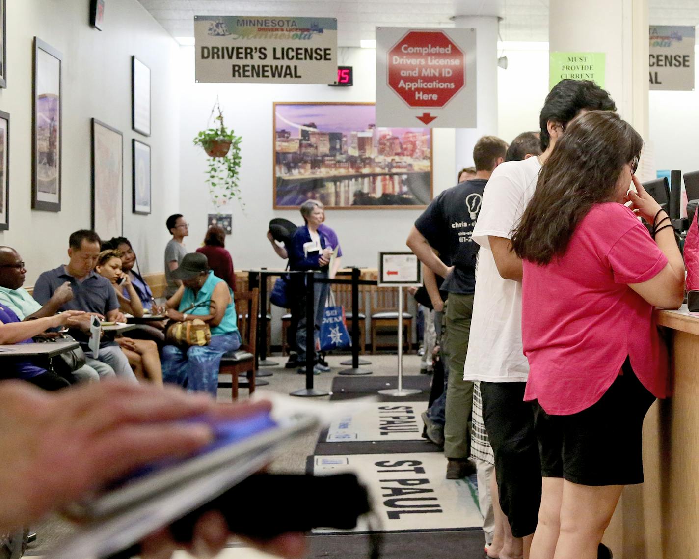 The scene inside the Minnesota DMV office in Sears Thursday, July 6, 2017, in St. Paul, MN.] DAVID JOLES &#xef; david.joles@startribune.com Minnesota's vehicle licensing will be down for a few days this month as the state completes a system upgrade. Will have the details of what this means for Minnesotans trying to use those services.