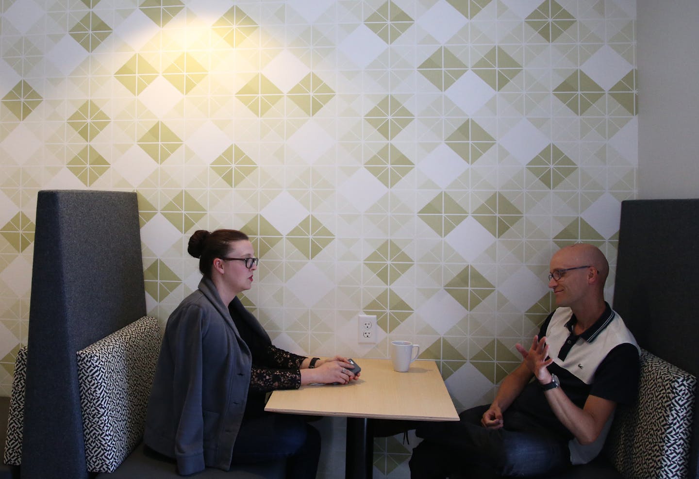 Avery Shnowske, and Nick Halverson chatted with each other in one of the eating areas on the newly redesigned fourth floor. ] (KYNDELL HARKNESS/STAR TRIBUNE) kyndell.harkness@startribune.com Fish & Richardson is a law firm that has recently built out a "hub" space -- or entire floor -- for its administrative departments in Minneapolis, Min., Friday July 31, 2015. t&#xed;s an intellectual property law firm and so they are careful about proprietary information. The photog will be asked to sign an