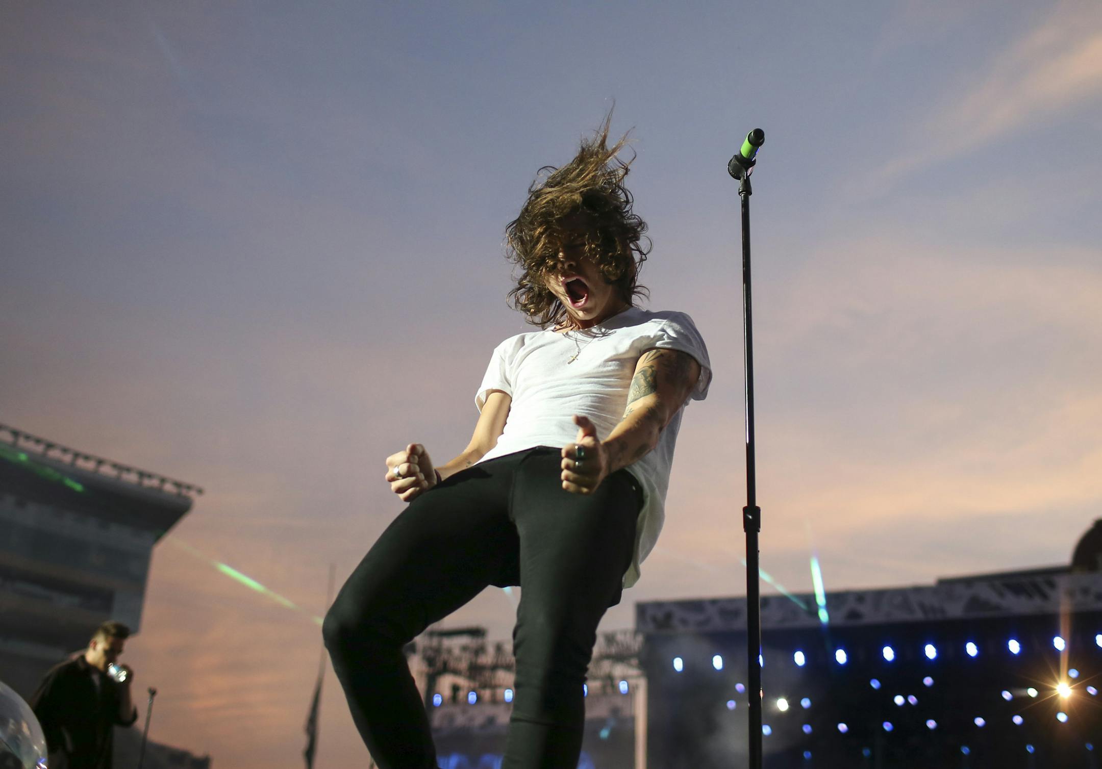 Harry Styles as One Direction performed "Little Black Dress" early in their set Sunday night at TCF Bank Stadium. ] JEFF WHEELER ï jeff.wheeler@startribune.com The boy band One Direction landed at TCF Bank Stadium for a show on their On the Road Again Tour 2015 Sunday night, July 26, 2015 in Minneapolis. Swedish electropop duo Icona Pop opened.