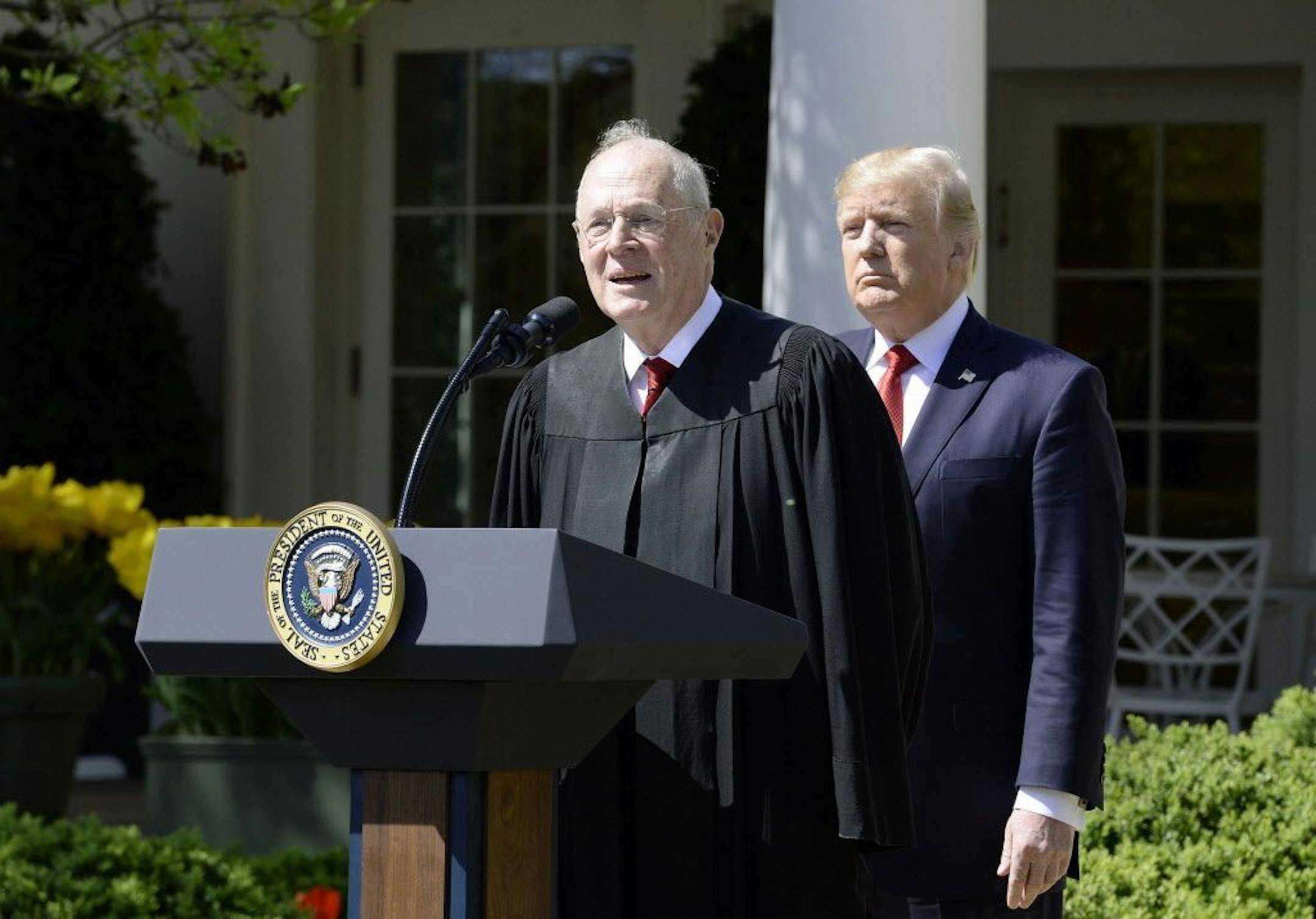 Justice Anthony Kennedy speaks as President Donald Trump looks on before Neil Gorsuch is sworn in as an associate justice of the Supreme Court on Monday.