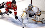 Blackhawks center Jonathan Toews clashed sticks with Predators goalie Pekka Rinne in a battle for the puck. Nashville swept Chicago in the first round