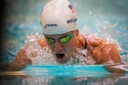 Swimmer Mallory Weggemann swam in the women's 100 meter breaststroke preliminaries during the 2020 US Paralympic Team Trials for swimming. ] LEILA NAV