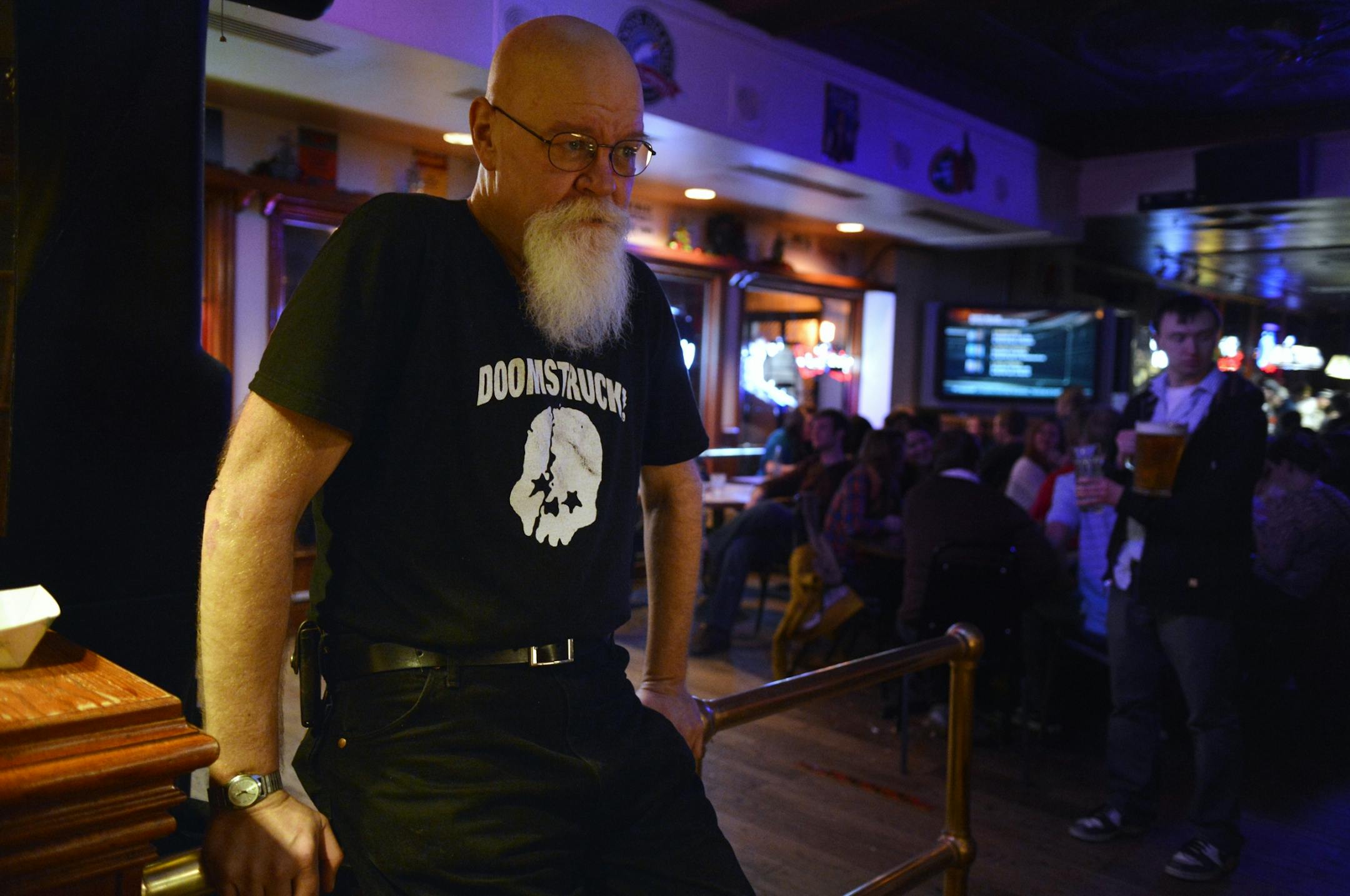 Ron Upton, who has spent 20 years keeping watch in Uptown bars. He has never thrown a punch, he said: "You use the brain before the muscle and you'll have a quarter, at the most, of the problems."
