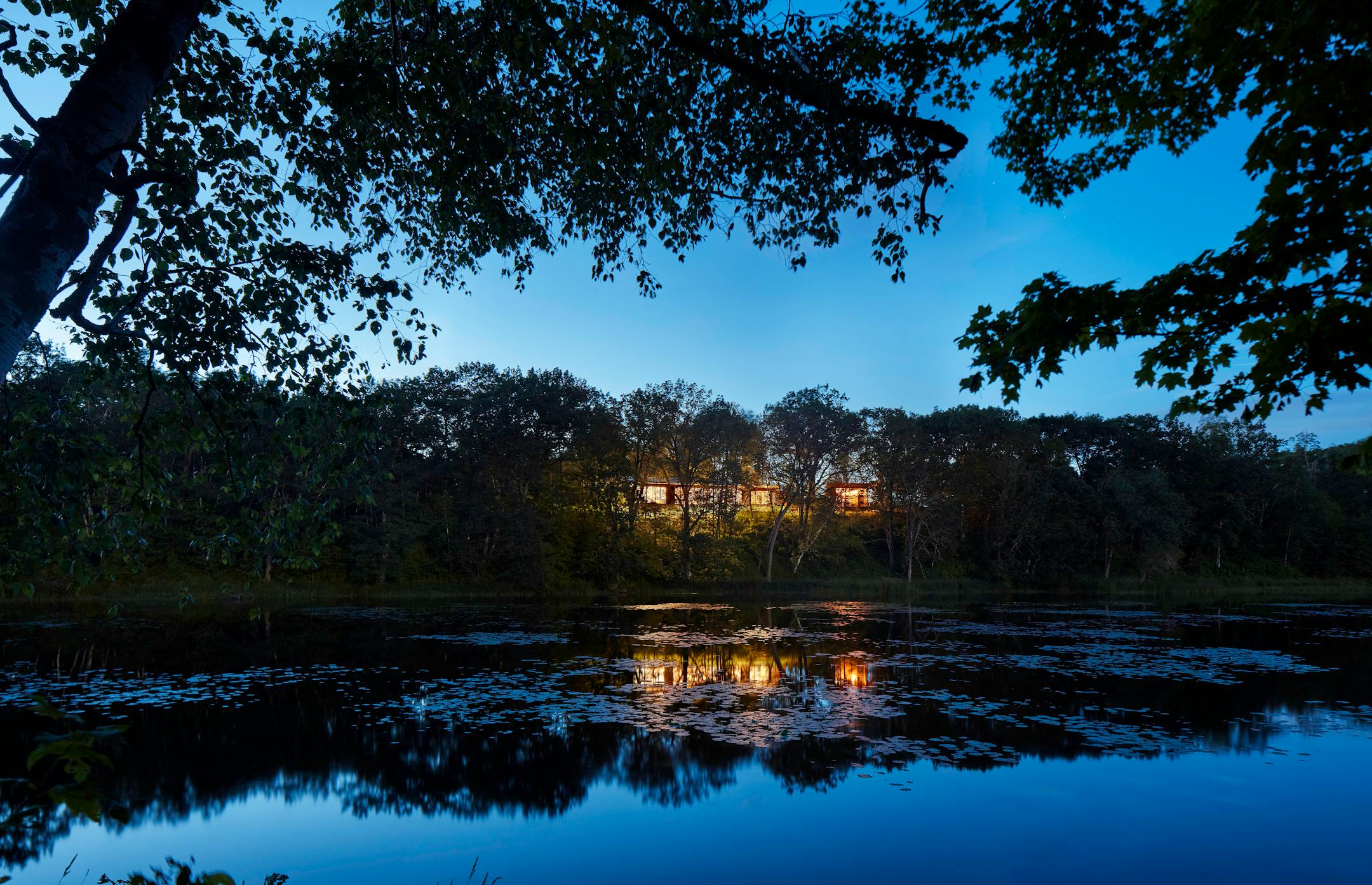 Set against a backdrop of rolling hills and prairie, SALA Architect's Home of the Month winning retreat is an restorative getaway in Frederic, Wis. that also restores the land.