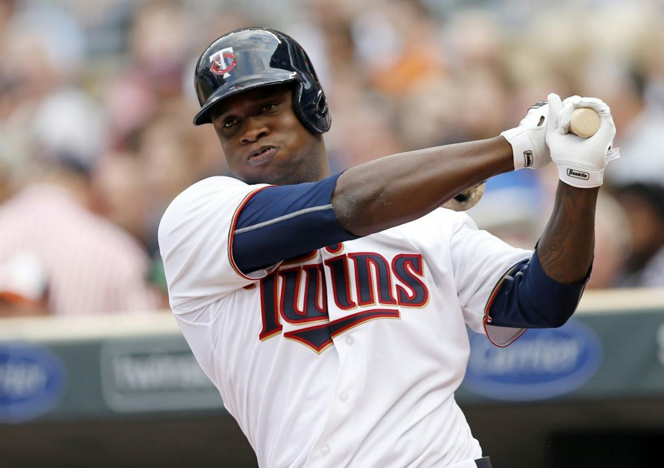 Sano takes practice swings before his home debut in July 2015.