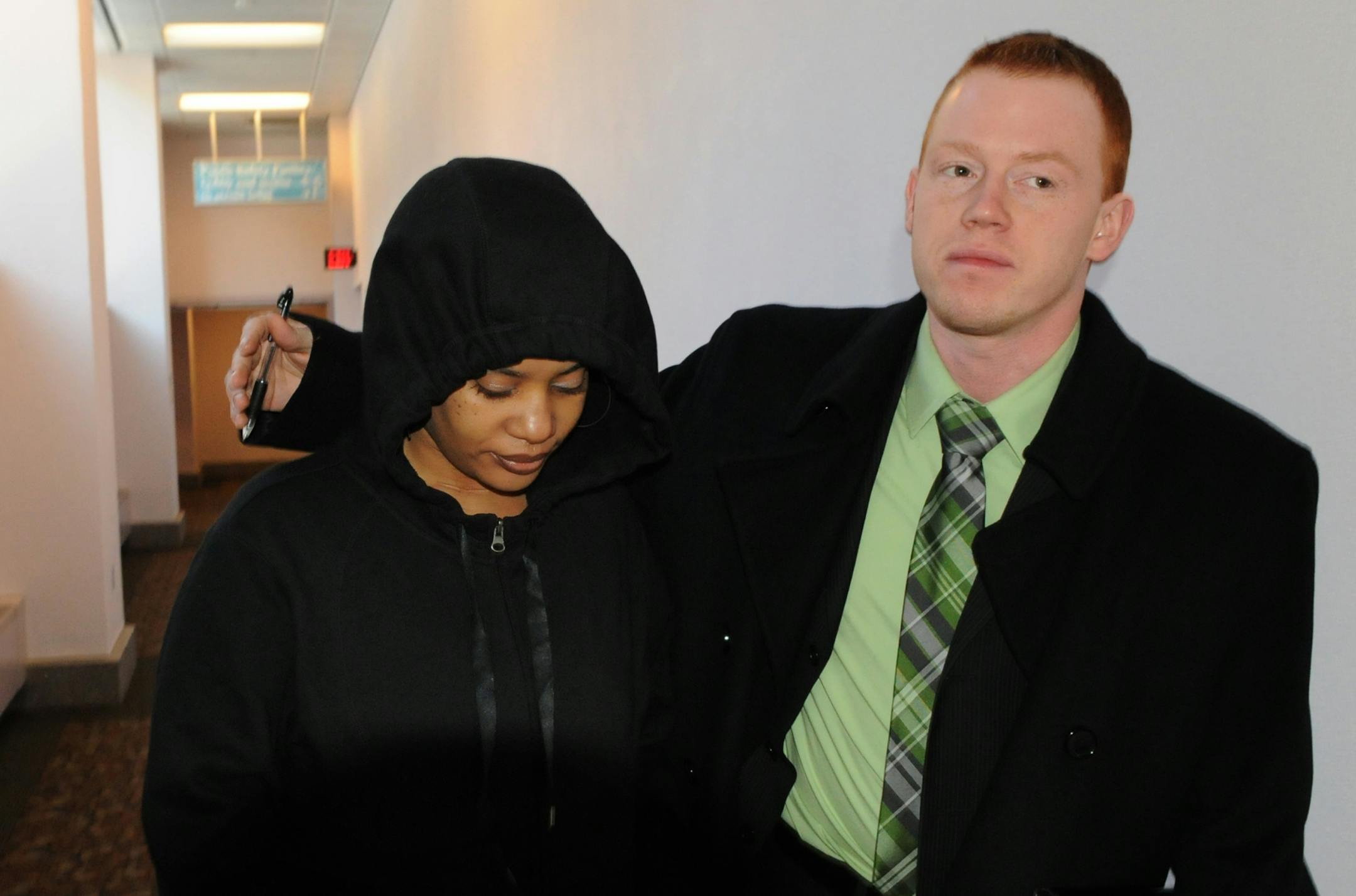 Stacey Champion, the woman accused of trying to mail Guess the puppy to Atlanta, appeared in court Monday morning to face misdemeanor animal cruelty charges.