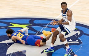 Anthony Edwards reacts after being called for fouling Jamal Murray during the second quarter. Both players were show-stoppers in Game 4.