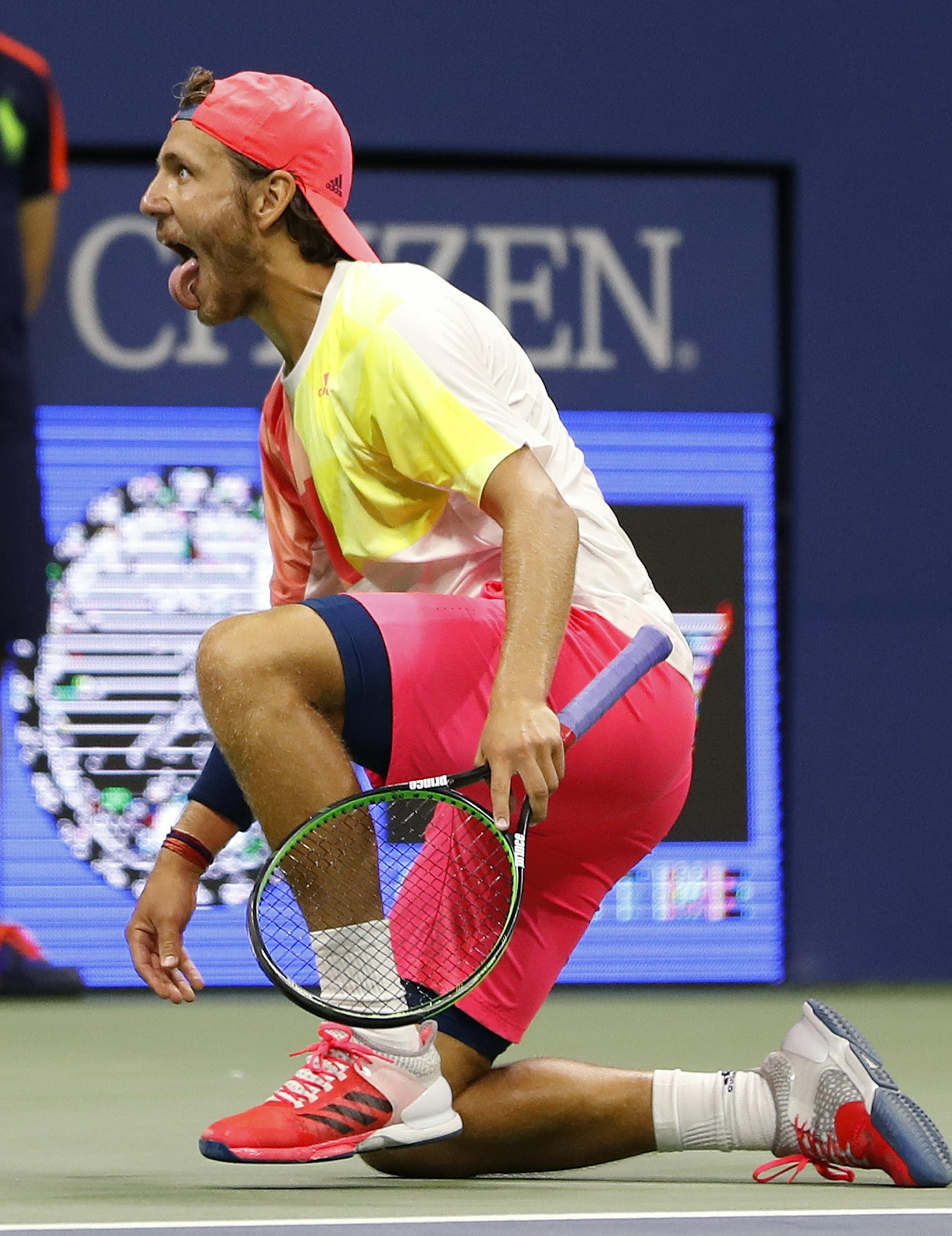 Lucas Pouille, of France, reacts after beating Rafael Nadal, of Spain, during the fourth round of the U.S. Open tennis tournament, Sunday, Sept. 4, 2016, in New York. (AP Photo/Alex Brandon)