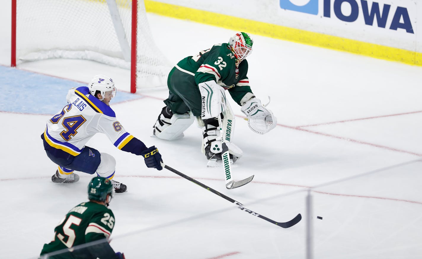 Alex Stalock, seen here playing the puck in a preseason game, picked up an assist in the Wild's 5-4 overtime victory Saturday against the Lightning. It was the sixth by an NHL goalie this season.