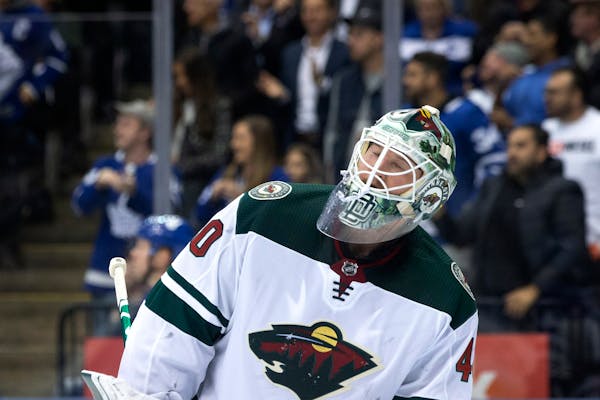 Wild goaltender Devan Dubnyk reacts after a Toronto goal during the second period on Tuesday
