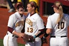Gophers' second baseman MaKenna Partain (3) congratulated pitcher Amber Fiser (13) after getting the third out against Iowa on Friday, April 26, 2019.