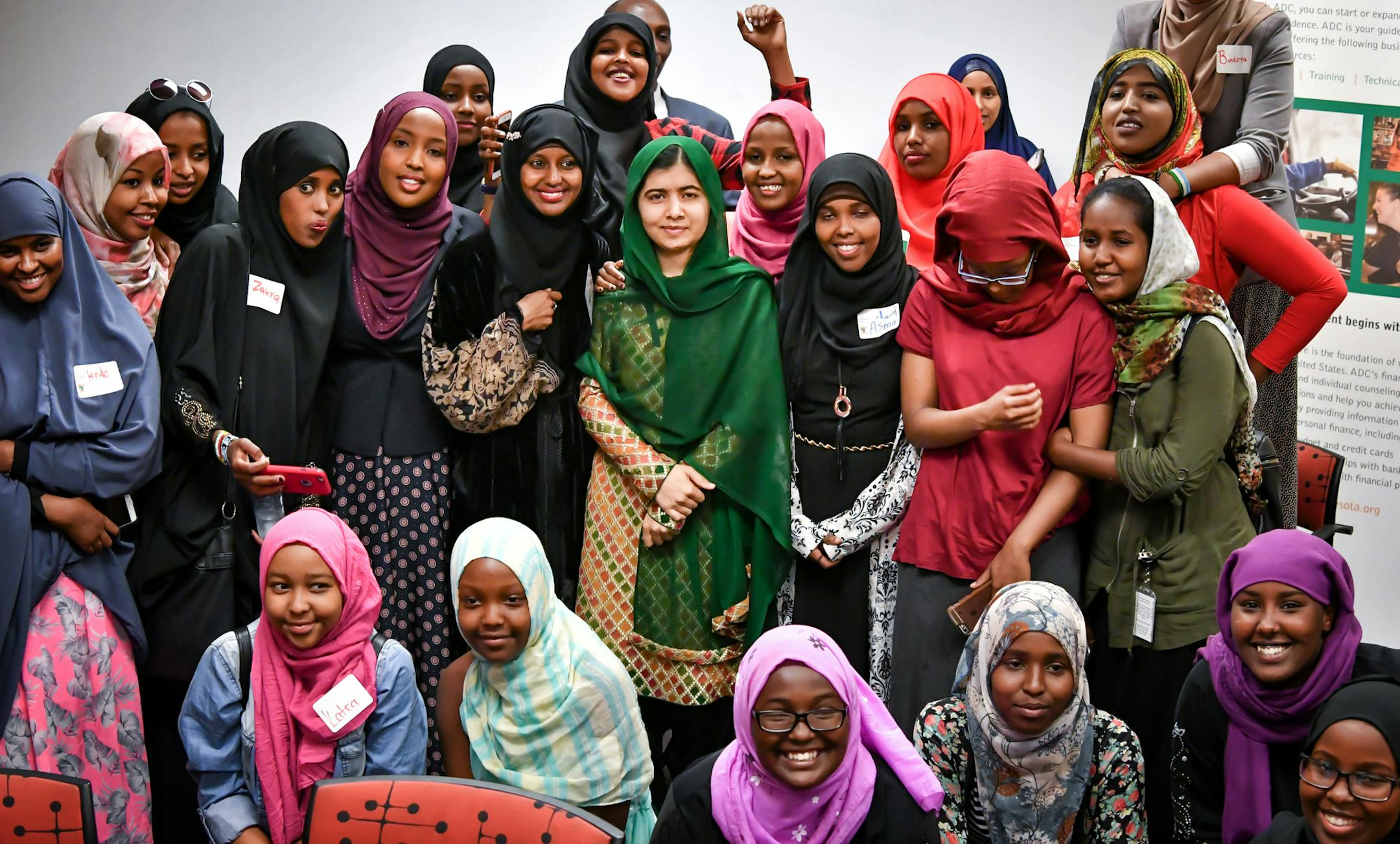 Malala Yousafzai spoke with a group of mostly Somali girls from the Newcomer Academy program in Minneapolis and then did what teen girls do in the U.S., posed for selfies and a group photo. ] GLEN STUBBE * gstubbe@startribune.com Monday, July 25, 2016 Malala Yousafzai, the youngest Nobel Peace Prize winner, surprised students from the Newcomer Academy program by showing up to a lunch being held for them at the Afro Deli.