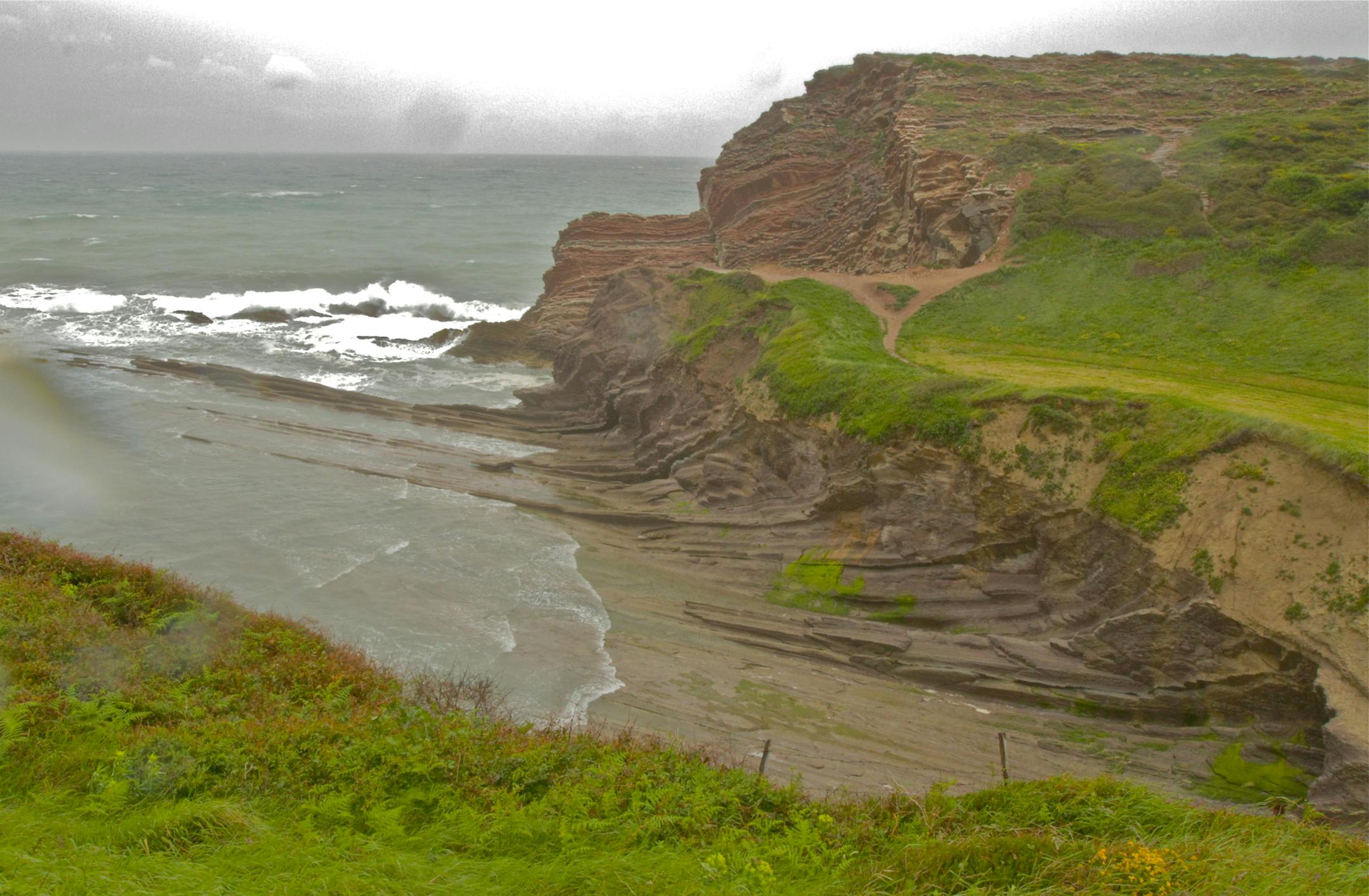Scenic landscapes, outcrops, Zumaia, Spain These rocks in Spain helped geologists determine what killed the dinosaurs. Credit: Howard Hughes Medical Institute