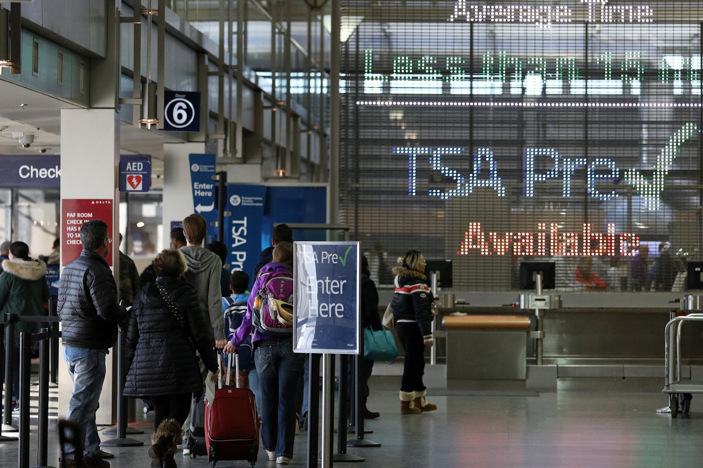 Travelers enter a TSA checkpoint Saturday. ] ANTHONY SOUFFLE &#x2022; anthony.souffle@startribune.com Officials have said security was heightened Saturday, Jan. 7, 2016 at Minneapolis St. Paul International Airpot in the days following an attack by a gunman at the Fort Lauderdale-Hollywood International Airport that left five people dead and six others wounded.